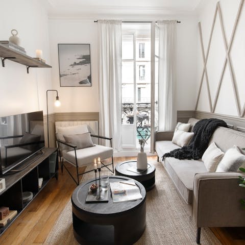 Relax in the stylish living area of this Parisian home