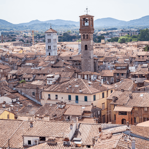 Wander the cobblestone streets of Lucca, only a twenty-eight-minute drive