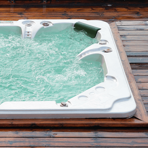 Kick back and relax in the exclusive hot tub