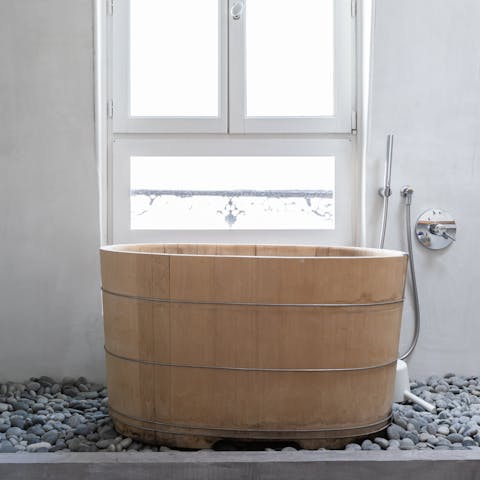 Unique Taiwanese bathtub on pebbles