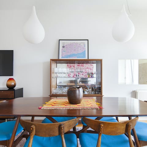 Gather for a delicious meal around the mid-century dining table