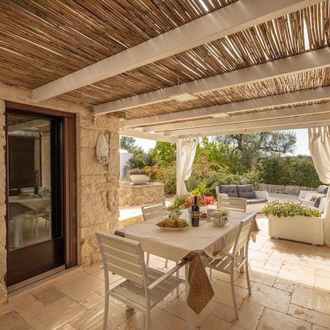 Find a little respite from the sun under your covered terrace