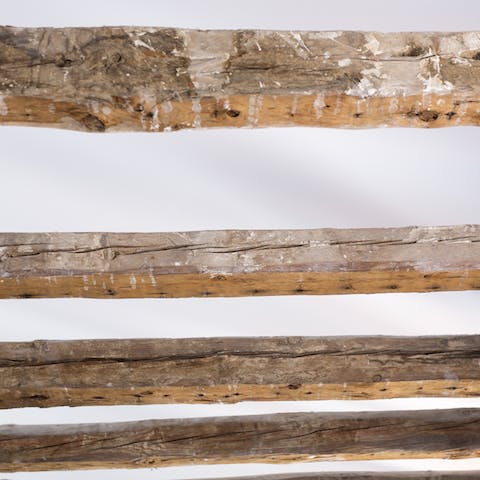 Exposed wooden beams on the ceilings