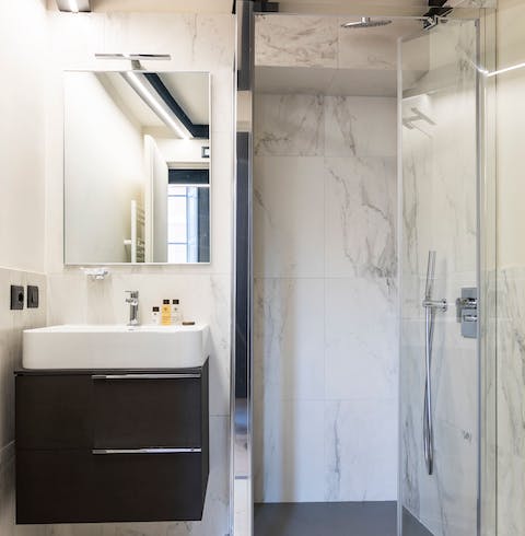 Get mornings off to a refreshing start in the marble shower
