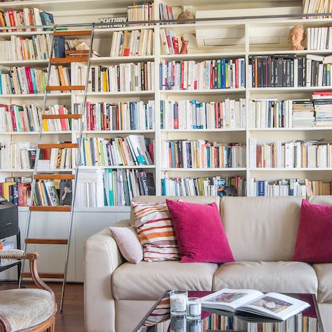 Root around through the packed bookshelves and recline on the sofa with a new read
