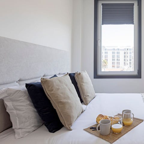 Wake refreshed and enjoy breakfast in bed as Porto wakes outside your window