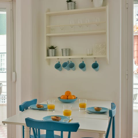 Eat together at the pretty table in the bright living space