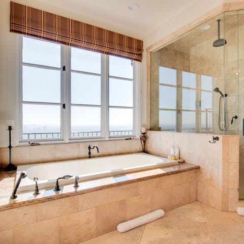 Indulge in a pampering session in the luxurious bathroom
