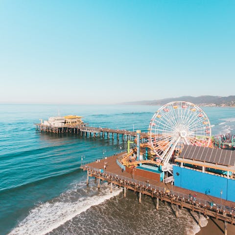 Head down to Santa Monica's storied pier and relax on the beach – it's fourteen miles away