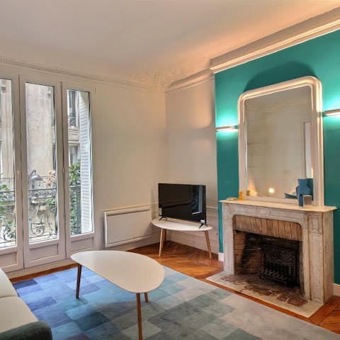 Snuggle up for a movie night in front of the feature fireplace