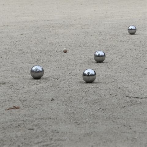 Play a few games of petanque at the golden hour