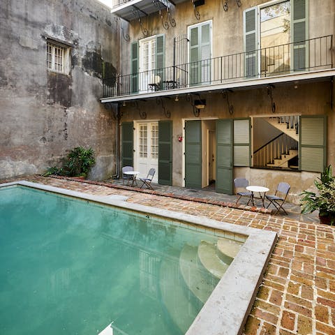Combat the Louisiana heat with a refreshing dip in the communal pool