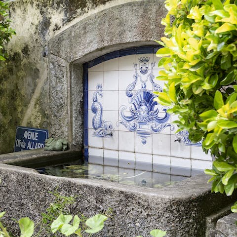 Find tranquility at the fish pond with classic Portuguese tiling