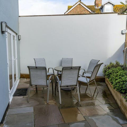 Enjoy some Dorset apple cake in the private courtyard