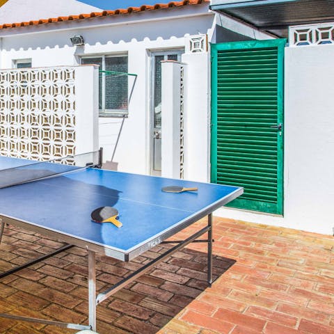 Play a game of table tennis in the spacious patio