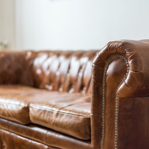 The brown leather chesterfield