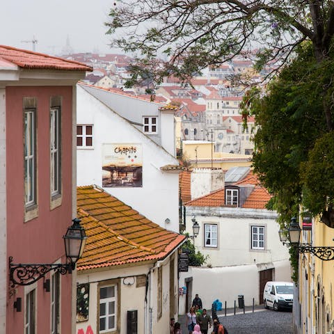 Wander through the pretty streets of Alfama, one of Lisbon’s oldest areas