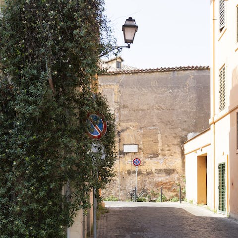 Stay in one of the pretty backstreets of Trastevere 