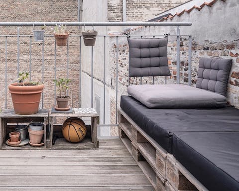 Relax in the shared rooftop garden