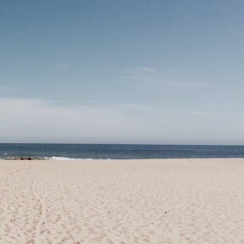 Lay on the sand at Praia de Matosinhos, only a six-minute walk away
