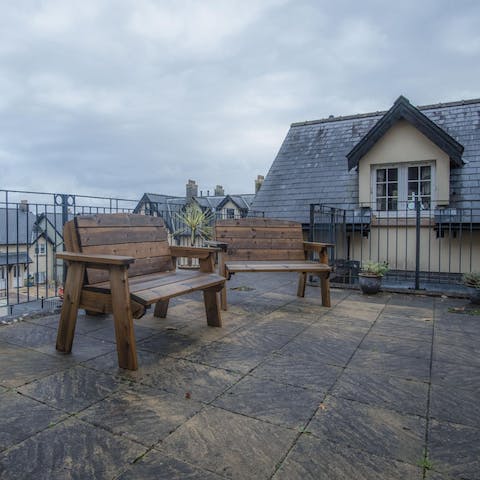 Enjoy a drink on the communal terrace