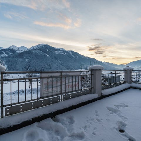 Take in incredible snow-peaked mountains from the balcony in winter