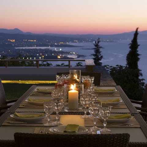 Indulge in chef-made meals on the terrace at dusk