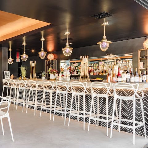 Enjoy access to the communal bar, where you can sip on a Palm Springs cocktail