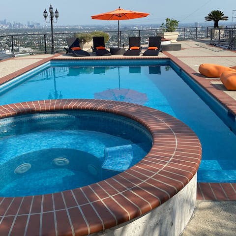 Relax in the pool and spa high above it all