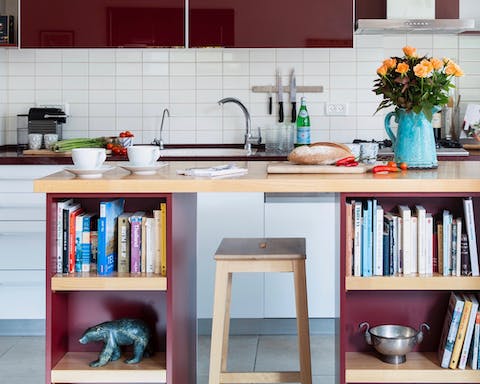 The burgundy cabinetry