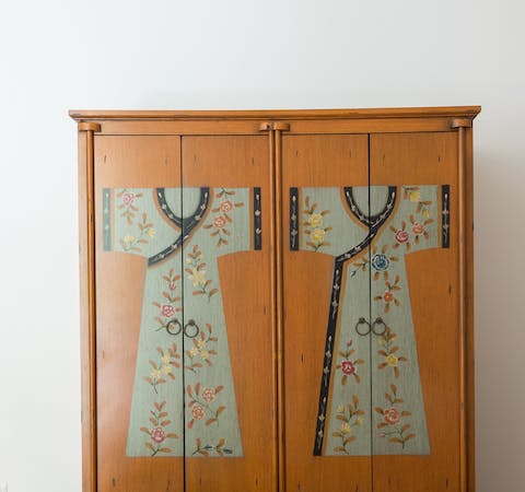 Admire the little touches such as the Japanese-style painted wardrobe 