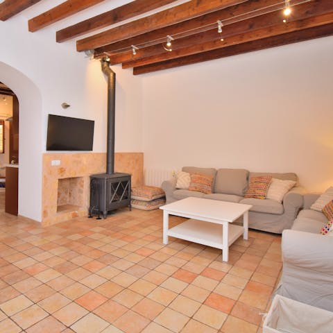 Cosy up in front of the log burner when the Mallorca weather turns chilly