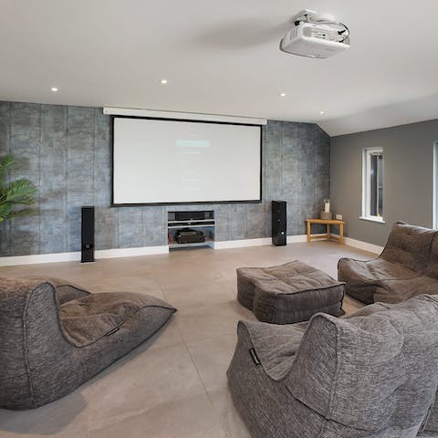 Screen a big blockbuster in the comfy cinema room