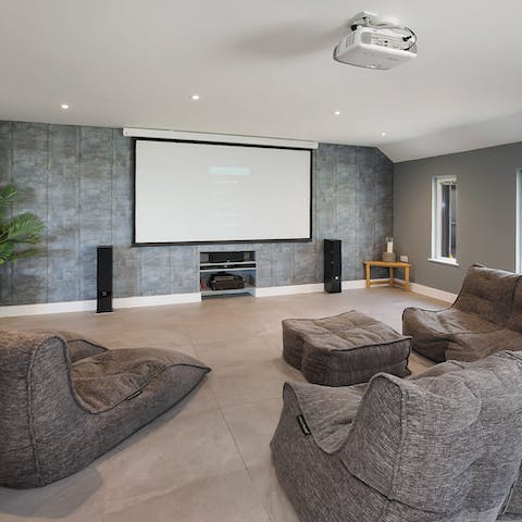 Screen a big blockbuster in the comfy cinema room 