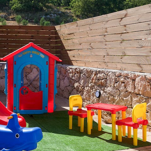 Let the kids' imaginations run wild in the outdoor play area