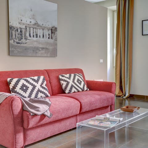 Kick back and relax on the comfy sofa with some Italian wine and a movie night with your loved ones