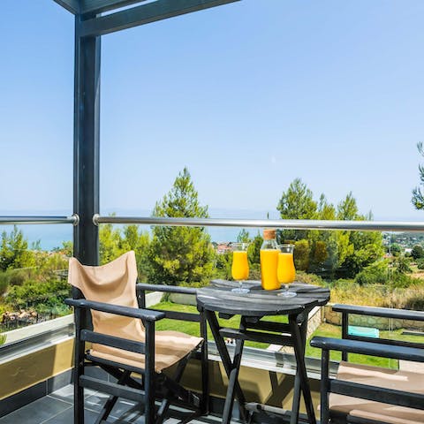 Dig into a fresh breakfast on the balcony, admiring the views of the sea