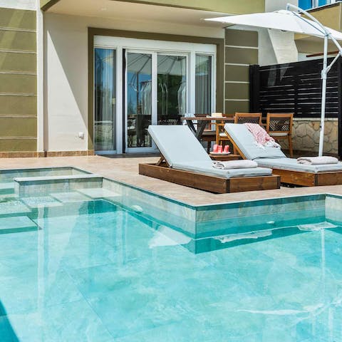 Lounge by the private pool and work on your tan