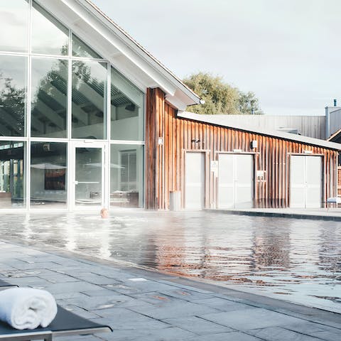 Slip away to take a plunge in one of the communal pools on site