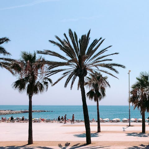 Hop in a taxi and head to Barceloneta Beach in just over ten minutes