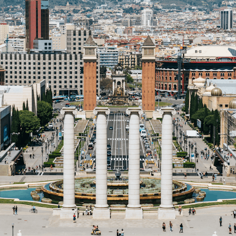 Take a fourteen-minute stroll to the heart of the city, Plaça d'Espanya