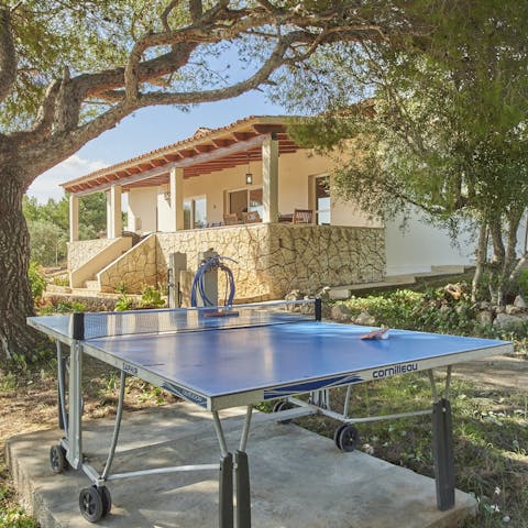 Challenge your loved ones to a friendly game of table tennis