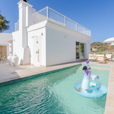 Make a splash in the private pool on a scorching afternoon
