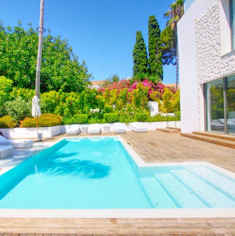 Slip into the private heated swimming pool