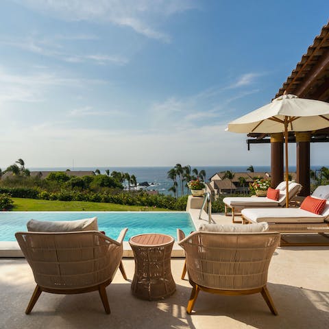 Stretch out on the plush loungers to soak up the Mexican sun