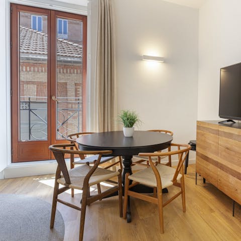 Stroll to a nearby tapas bar or savour meals at home