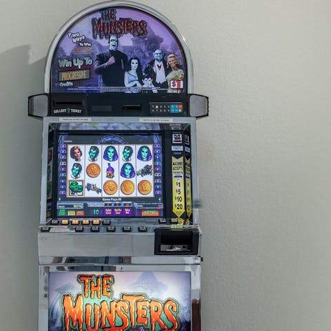 Try your luck on the vintage The Munsters slot machine