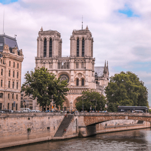 Nip over to the neighbouring  Île de la Cité to marvel at the Notre Dame, just a short walk away