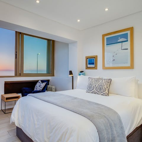 Wake up to magnificent blue vistas in the comfortable main bedroom