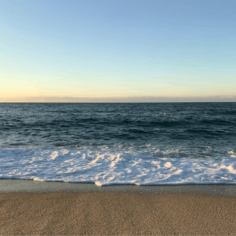 Sun yourself on the sand of Plakes Beach, reached by foot